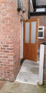 The door ahead and to the left
