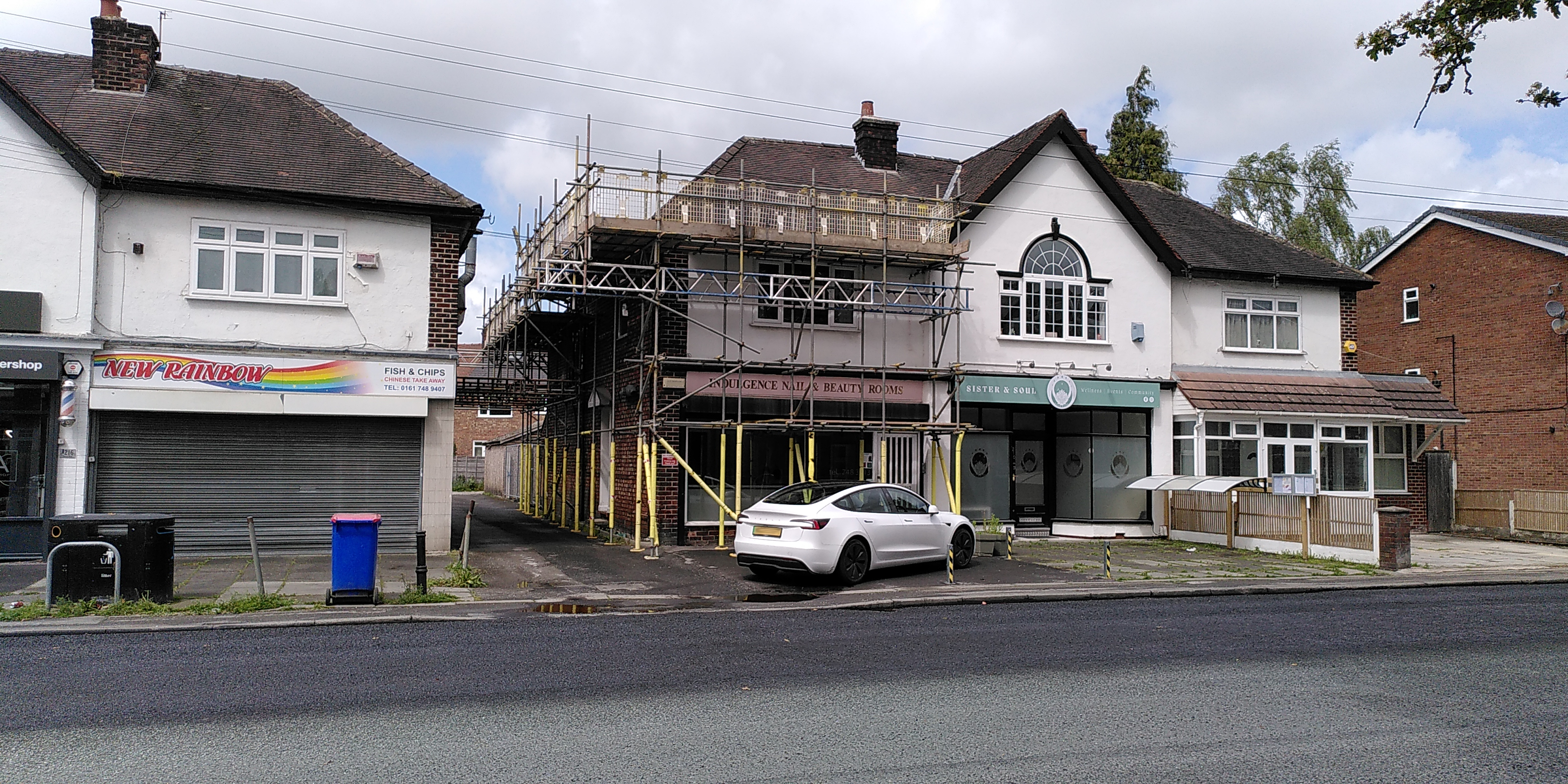 Image showing Sister & Soul, New Rainbow Fish and Chips and Indulgence Nails and Beauty Rooms from across the road, and the driveway entrance